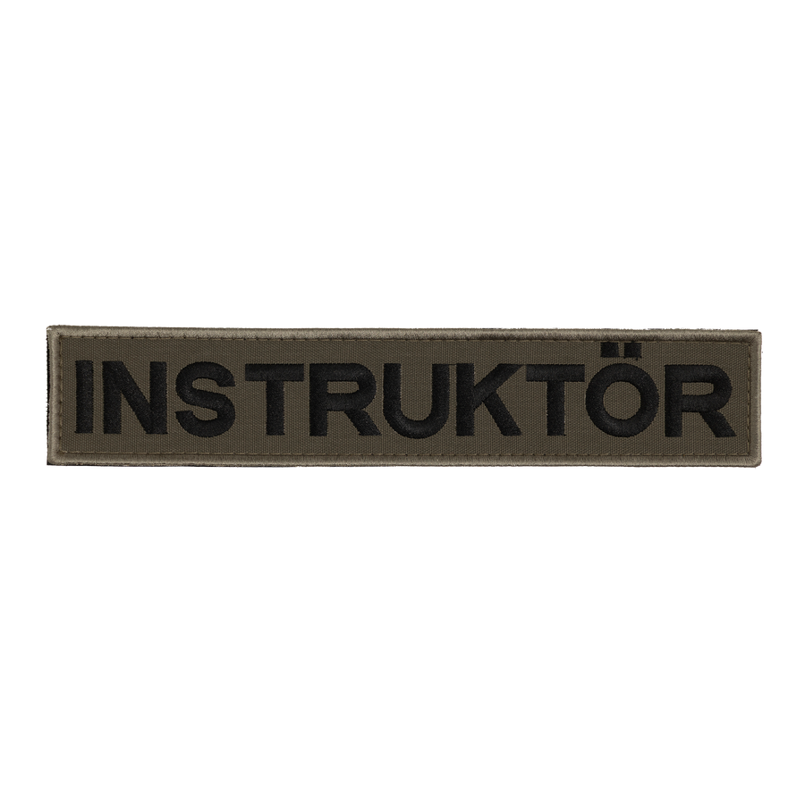 Snigel INSTRUKTÖR-märke (Stort) 260 × 50 mm – Kardborremärke (Grå/Svart)