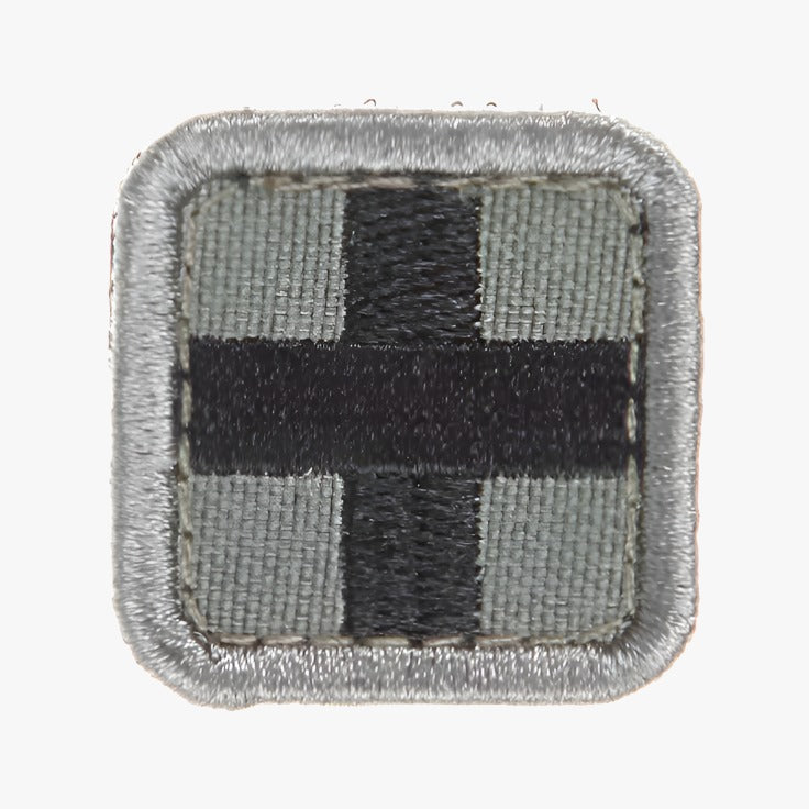Snigel Sjukvårdsmärke (Kors) 25 × 25 mm – Kardborremärke (Grå/Svart)