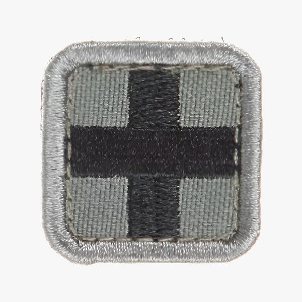 Snigel Sjukvårdsmärke (Kors) 25 × 25 mm – Kardborremärke (Grå/Svart)